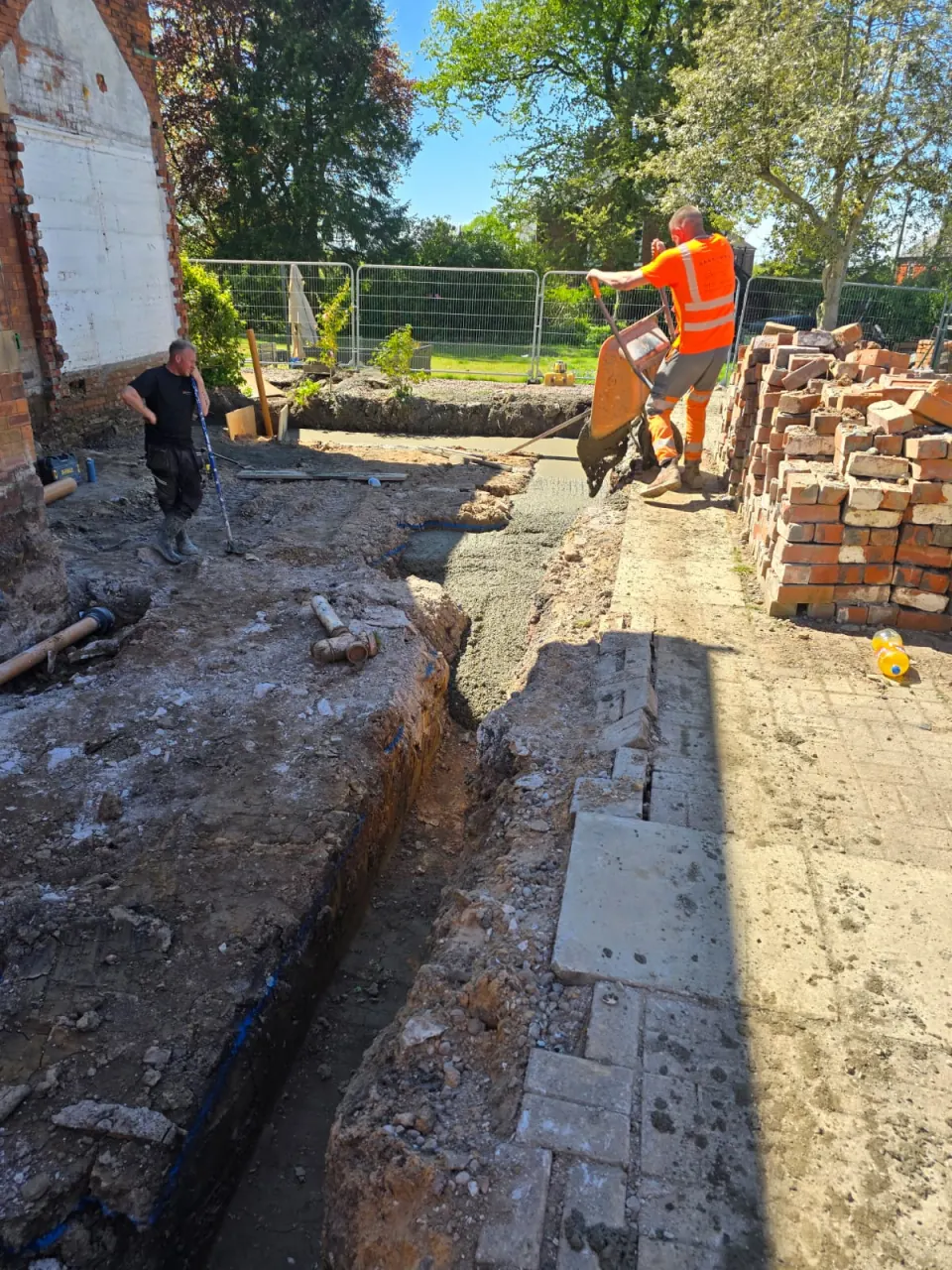 Barrowing concrete to a house-extension footing