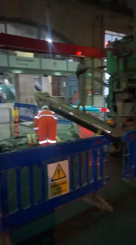 Night concrete pump work for new safety fencing beside the railway at Manchester Victoria