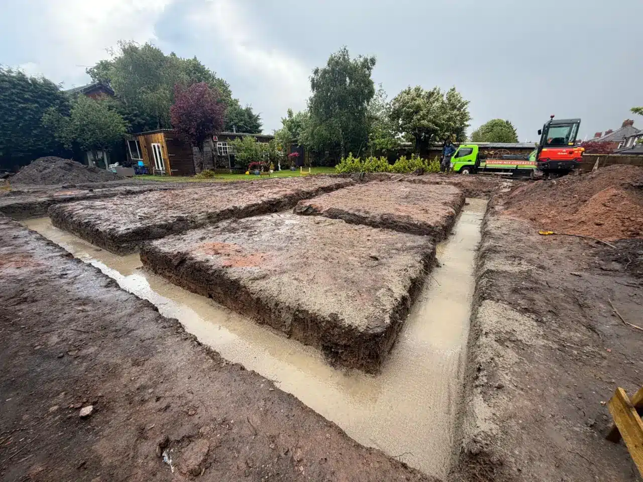 Concrete poured into new-build strip foundations with a Barrow Mix truck in Northwich