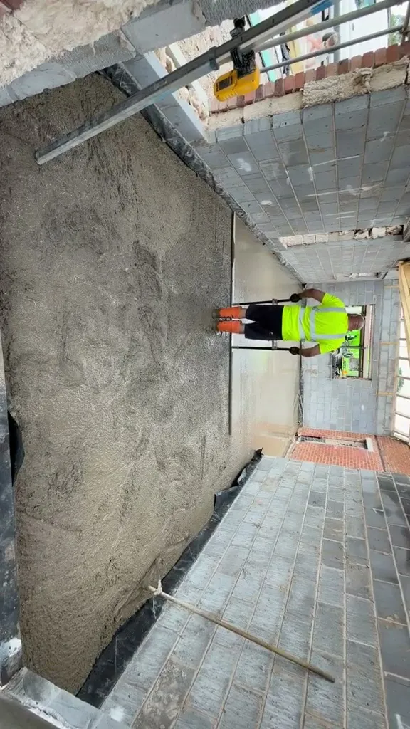 Barrow Mix laying ready mix concrete floors in the Gawsworth bungalow