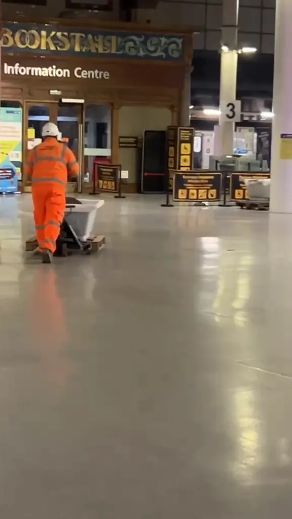 Night railway safety fencing concrete work at Manchester Victoria station