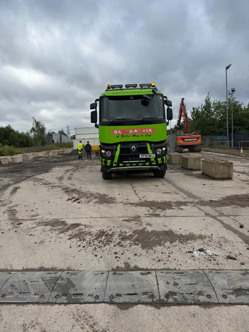 Barrow Mix concrete truck beside the weighbridge deck at the Salford site