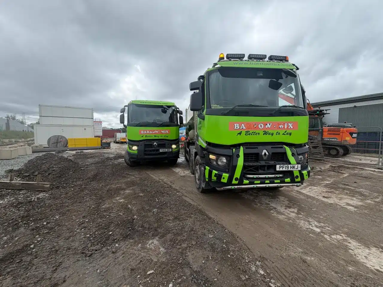 Two branded Barrow Mix concrete trucks on the Salford weighbridge job