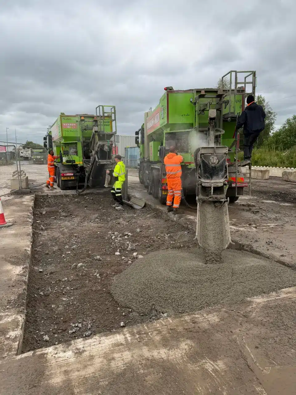 Barrow Mix volumetric mixer discharging concrete into the new weighbridge base in Salford