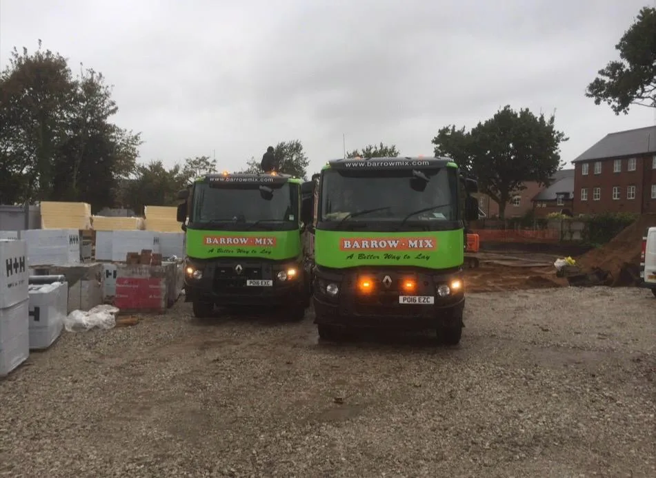Barrow Mix wagons on the eight-townhouse development site in Lymm