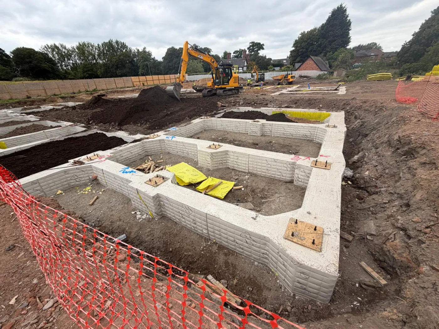 Trench-fill concrete foundations across the Calore Homes housing plots in Thelwall, Warrington