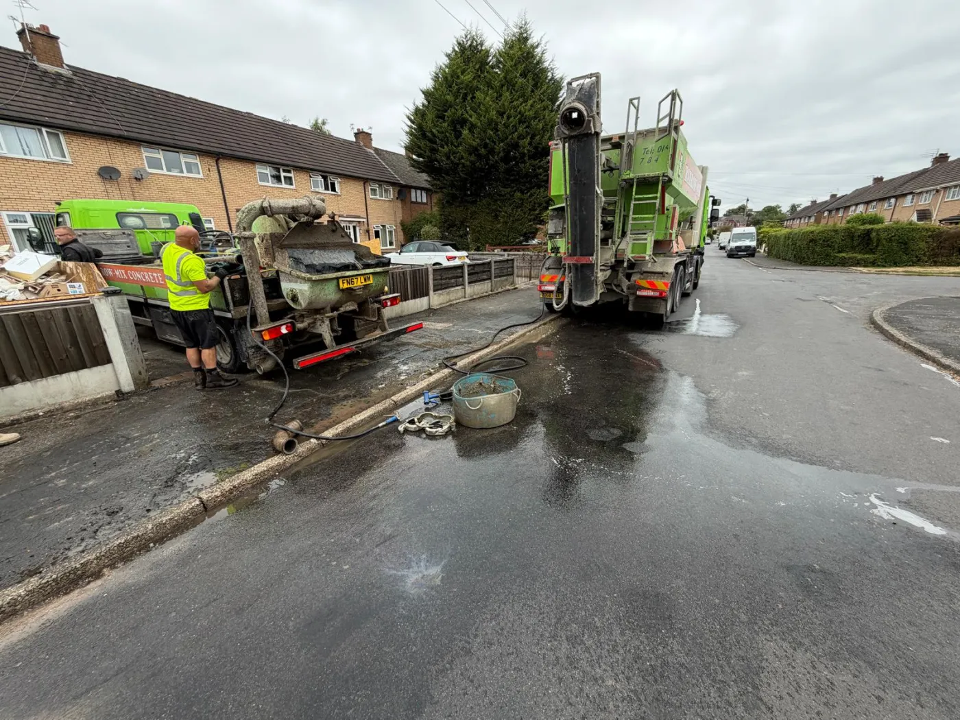 The Barrow Mix team washing down and leaving the road spotless after a concrete pump job in Sale
