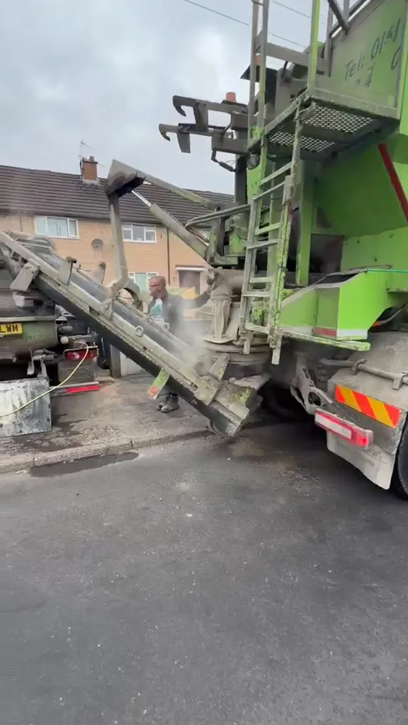 Barrow Mix pumping concrete through a house to reach the rear in Sale