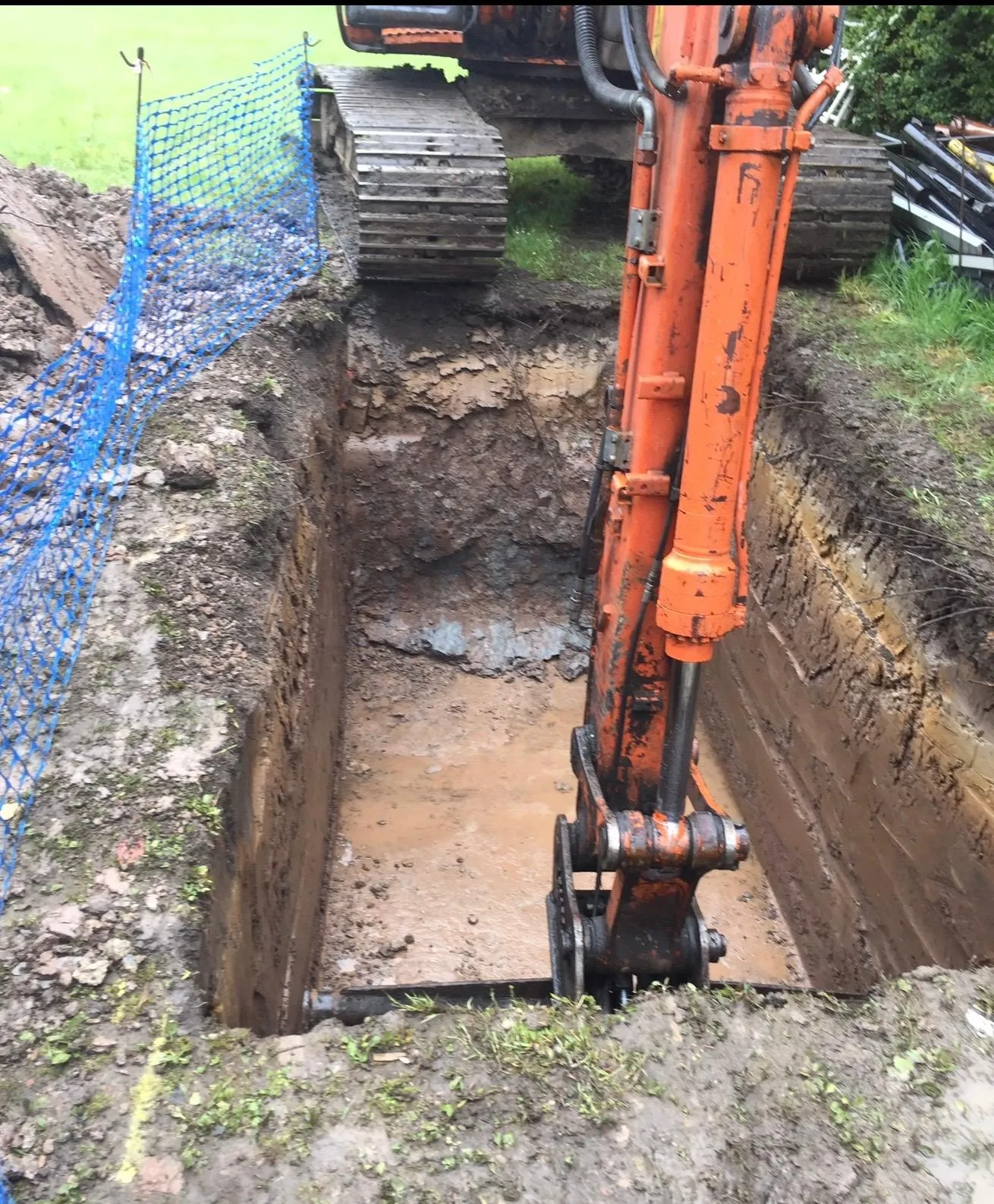 Deep pit excavated for a concrete LPG gas-tank base at a new-build home in Mobberley, Cheshire
