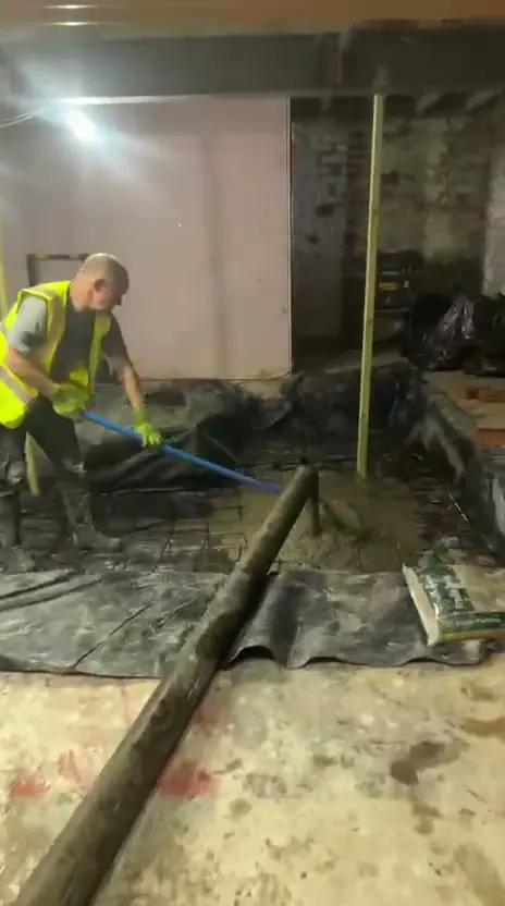 Barrow Mix line pump running through a back yard into a building in Eccles