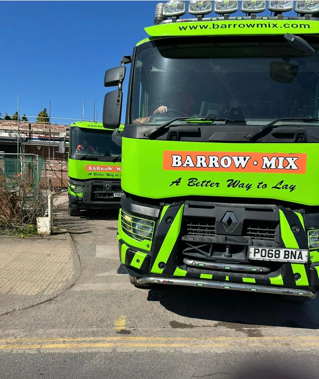 Barrow Mix concrete wagons lined up for an early Saturday floor pour in Cadishead