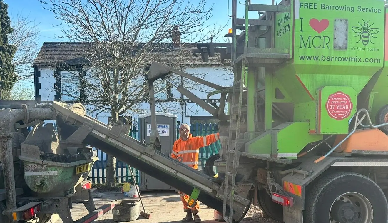 Volumetric wagon feeding the concrete pump outside the Tesco Express in Cadishead