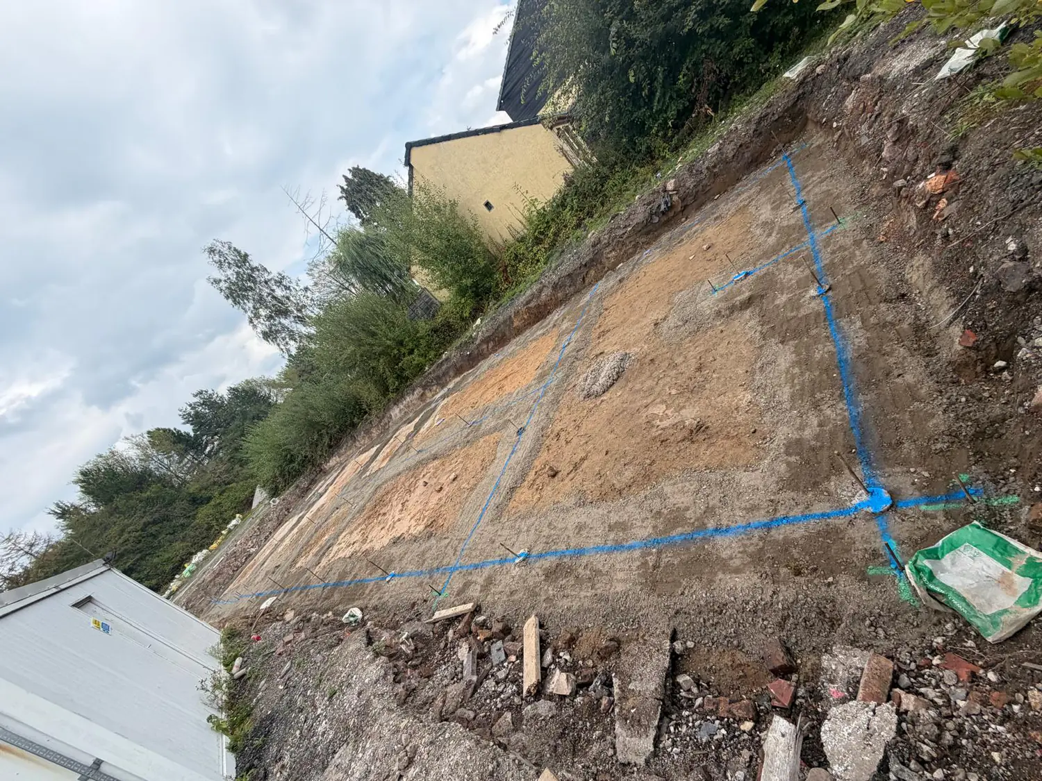 New-build plot in Bramhall set out with string lines after steel piling